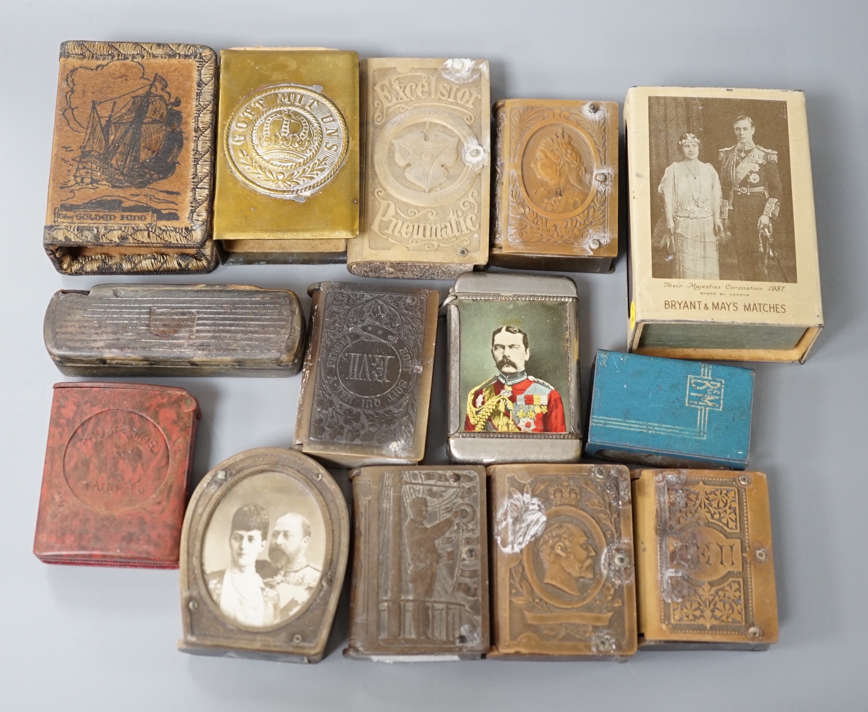 A collection of Victorian and later vestas and matchbox holders, some commemorative